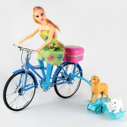 кукла на велосипеде с собачками. игрушка