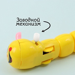 заводная гусеница.игрушка