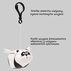 заводная панда с крыльями. игрушка